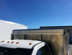 Buyers Products TDH7512 Pull-Style Tarp System with 7.5' x 12' Black Mesh Tarp, Aluminum Deflector and Housing - BUY TDH7512