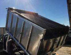 Buyers Products TDH7512 Pull-Style Tarp System with 7.5' x 12' Black Mesh Tarp, Aluminum Deflector and Housing - BUY TDH7512