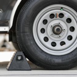 Buyers Products WC6810L Rubber Wheel Chock with Chain Eye - 10" x 8" x 6" - BUY WC6810L